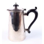 A 20th century silver coffee pot.