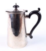 A 20th century silver coffee pot.