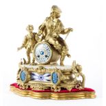 A French gilt-metal and porcelain mounted eight day striking mantel clock.