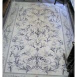 A Large Laura Ashley Malaison rug with matching runner.