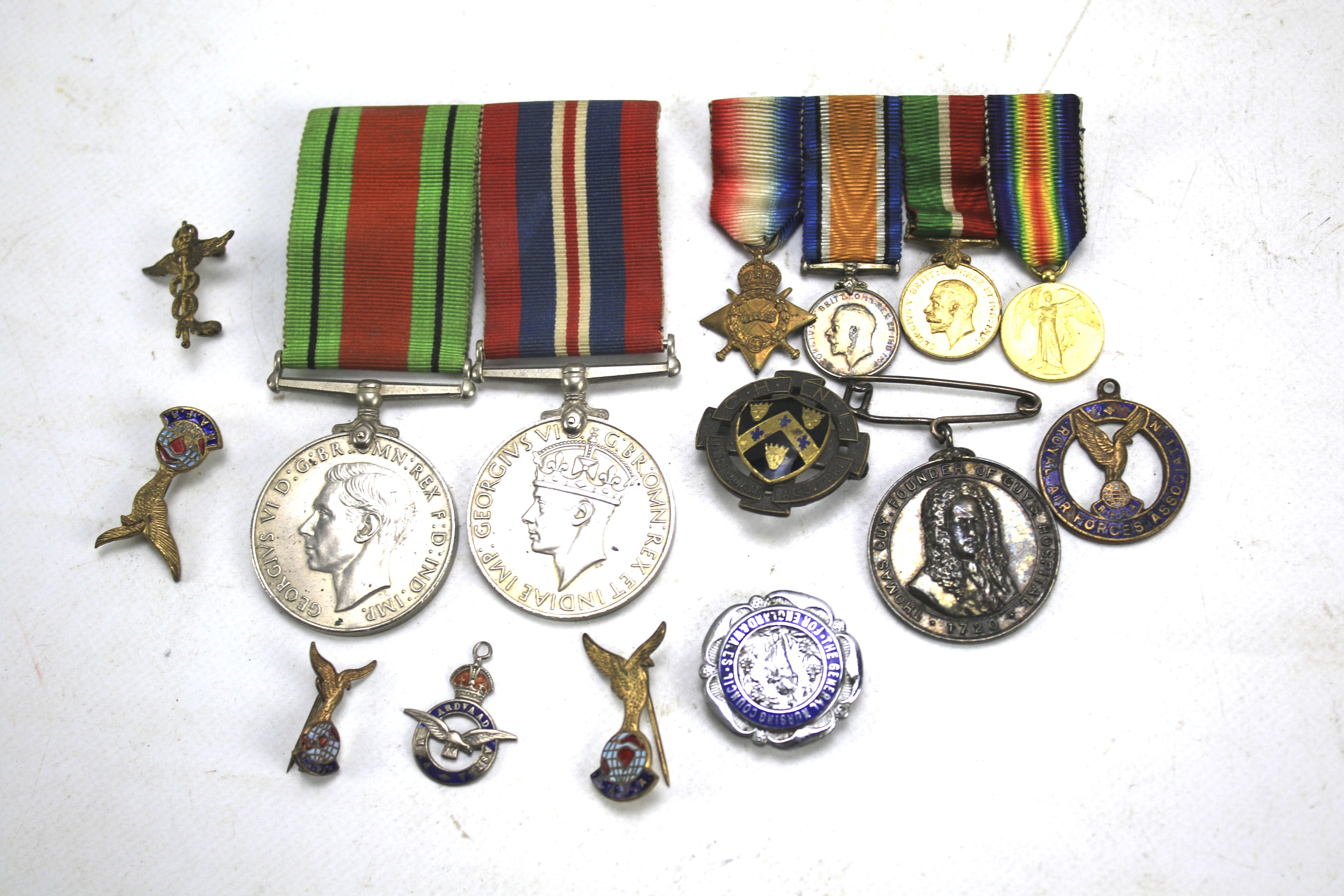 A collection of badges and medals.