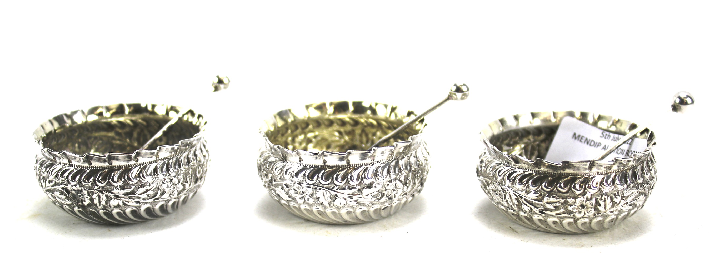 Three Victorian silver small condiment bowls and spoons.