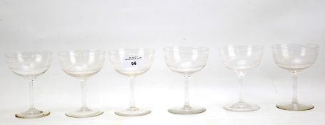 A set of six Art Deco cocktail glasses. All with etched details and circular bases, H11.