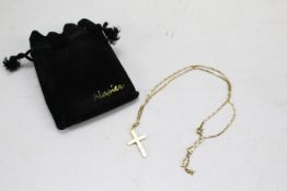 A 9ct gold crucifix on chain. The crucifix stamped 375, the chain hallmarked, gross weight 7.