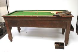 A vintage Sams Brothers Ltd mahogany coin operated bar billiard table.