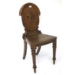 A 19th century oak chair.