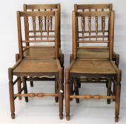 A set of four late 19th century oak chairs.