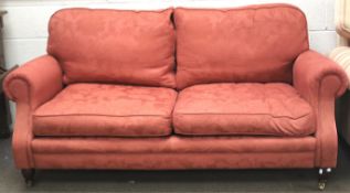 A two seater sofa by Wesley Barrell.