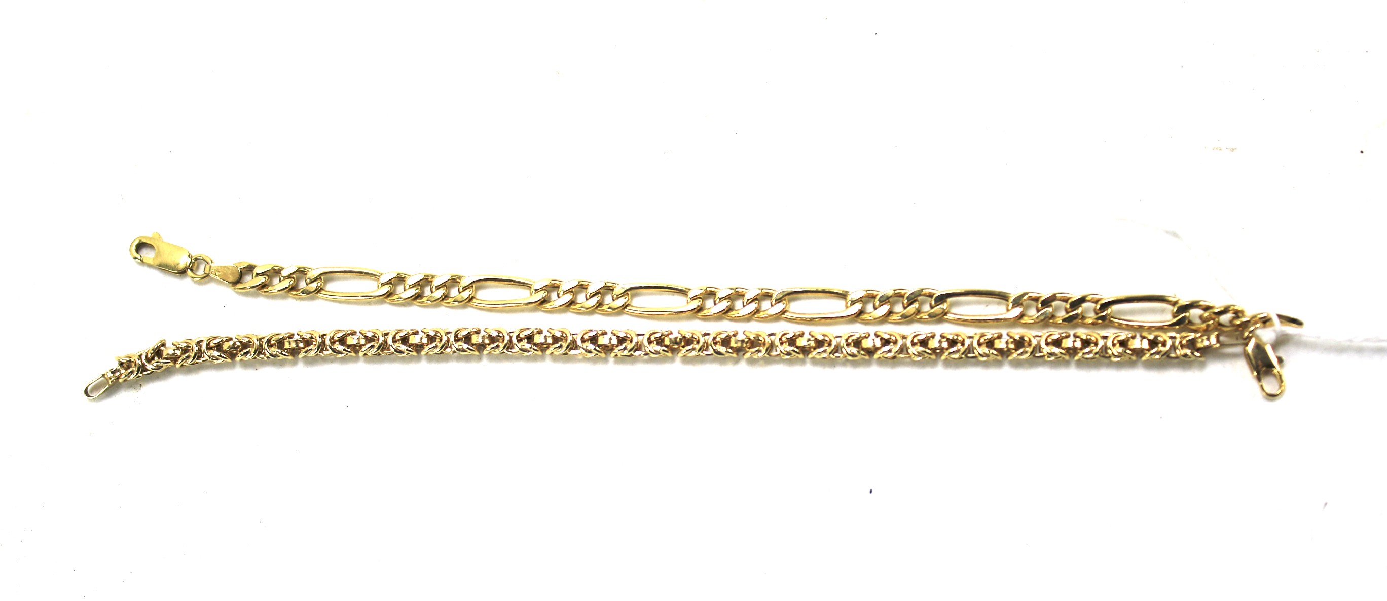 Two 9ct gold bracelets. One being a fancy link chain. Combined weight 8.