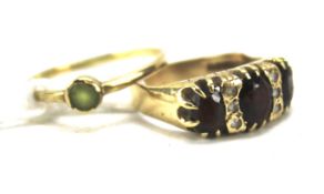 Two 9ct gold stone set rings.