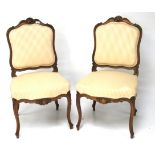 A pair of 20th century hall chairs.