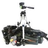 An assortment of cameras and related accessories.