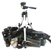 An assortment of cameras and related accessories.