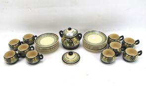 A Quimper pottery part tea service. 20th century, painted P.