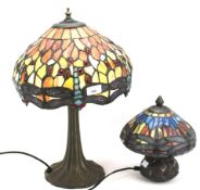 Two reproduction Tiffany style leaded glass table lamps.