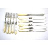 A set of Victorian silver and mother of pearl handled knives and forks.