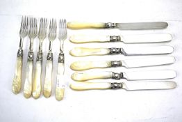 A set of Victorian silver and mother of pearl handled knives and forks.