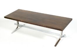 A mid-century rosewood topped chrome coffee table.