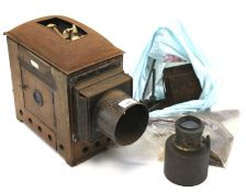 A 19th century J Lancaster & Son mahogany and metal cased magic lantern and assorted components.