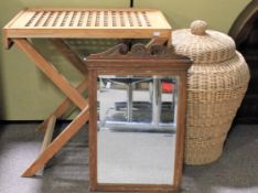 Two items of furniture and a large woven basket.