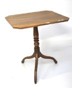 A mahogany occasional table.