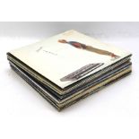 A collection of vinyl albums.