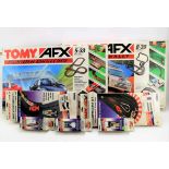 Two Tomy AFX Computer Challenge sets with additional tracks and cars Condition Report: