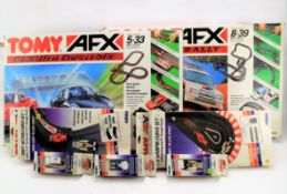 Two Tomy AFX Computer Challenge sets with additional tracks and cars Condition Report: