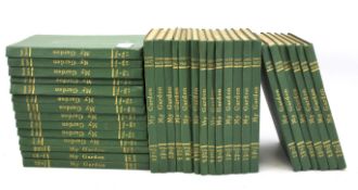 A collection of 'My Garden' book volumes.