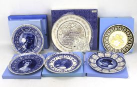 A collection of Wedgwood commemorative ceramic plates regarding the British Royal Family.