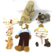 An assortment of vintage soft toys.