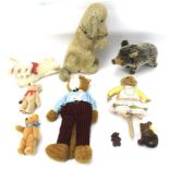 An assortment of vintage soft toys.