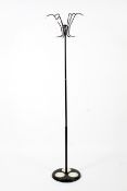 A retro black 1960s metal, chrome and plastic mounted coat stand.