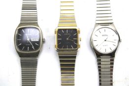 Three vintage quartz wristwatches.