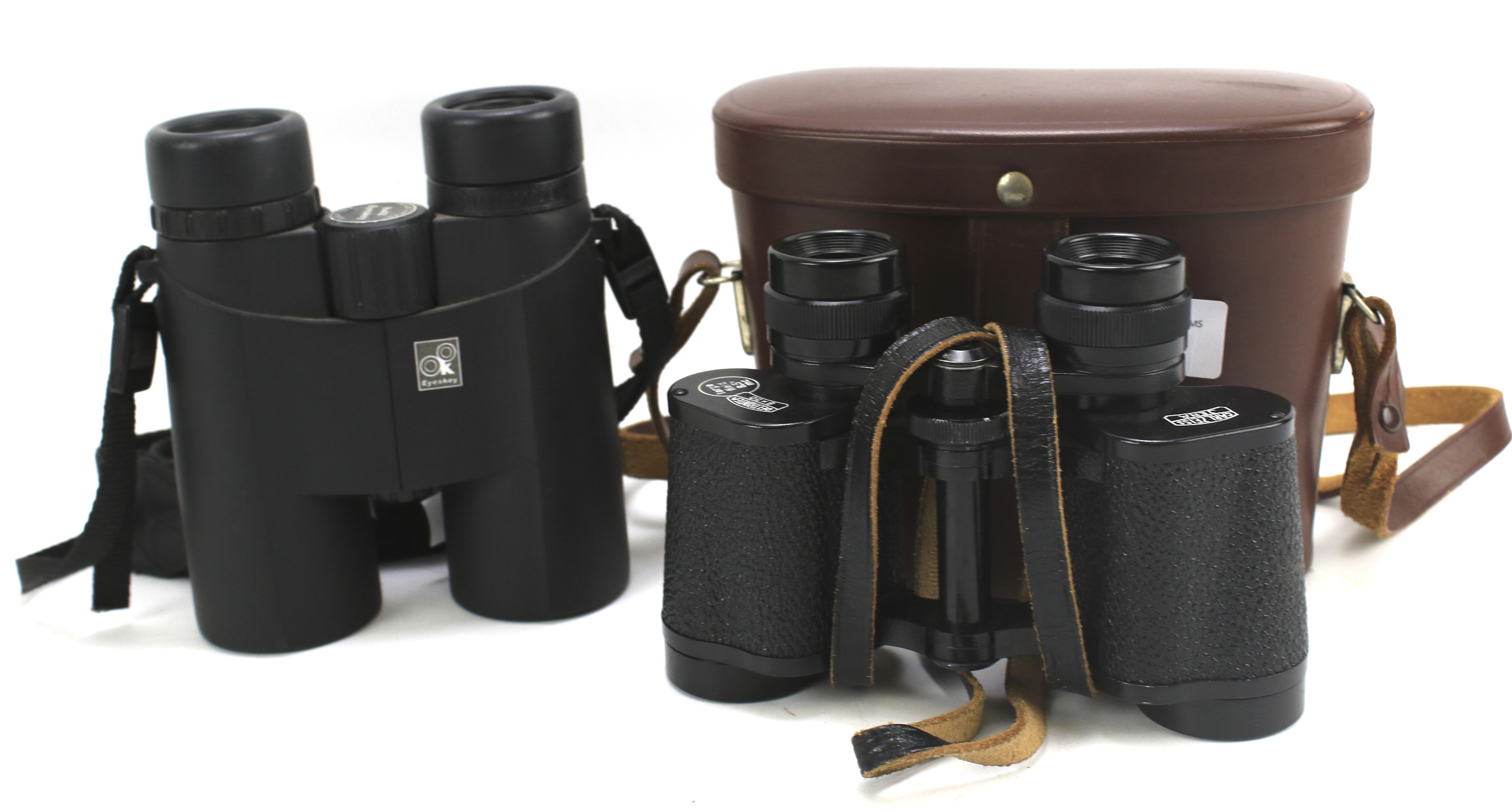 Two pairs of binoculars.