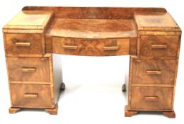 An Art Deco burr walnut veneer dressing table.