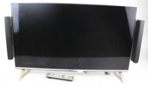 Panasonic wide screen television with rear mounted surround sound. 40 inch.