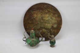 A Chinese soapstone circular plaque and two white metal and hardstone mounted vessels.