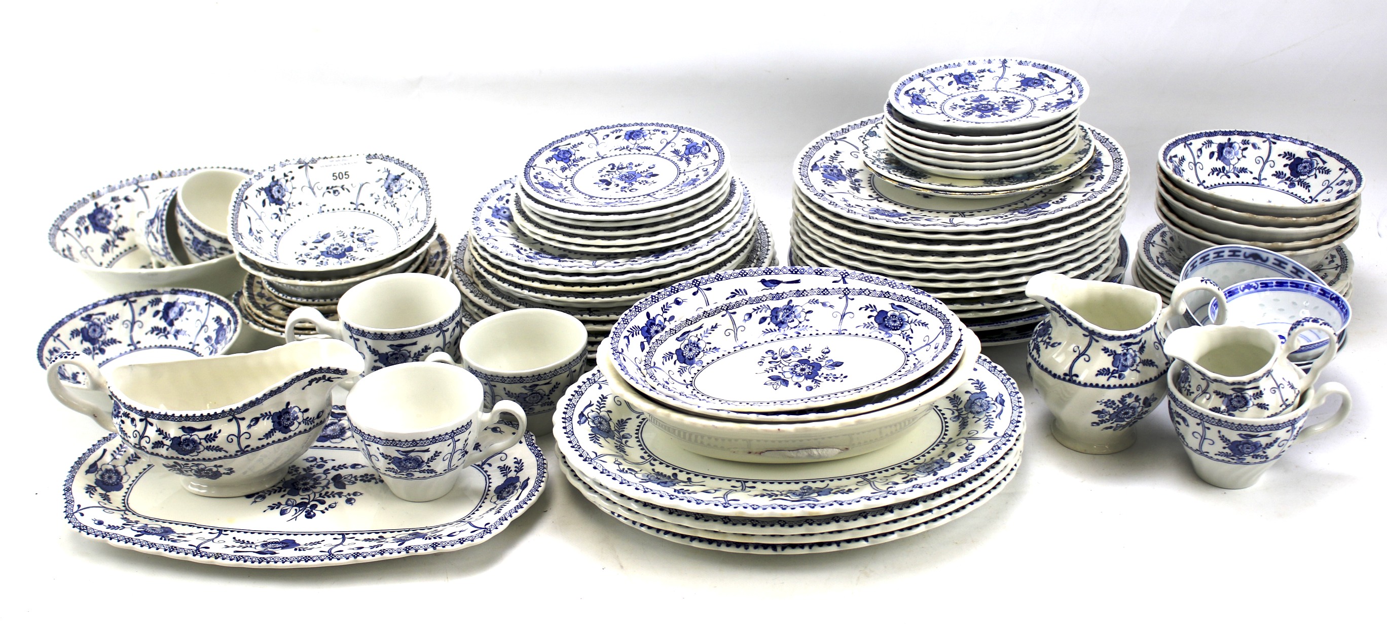 A Johnson Bros dinner and tea services and an assortment of ceramics.