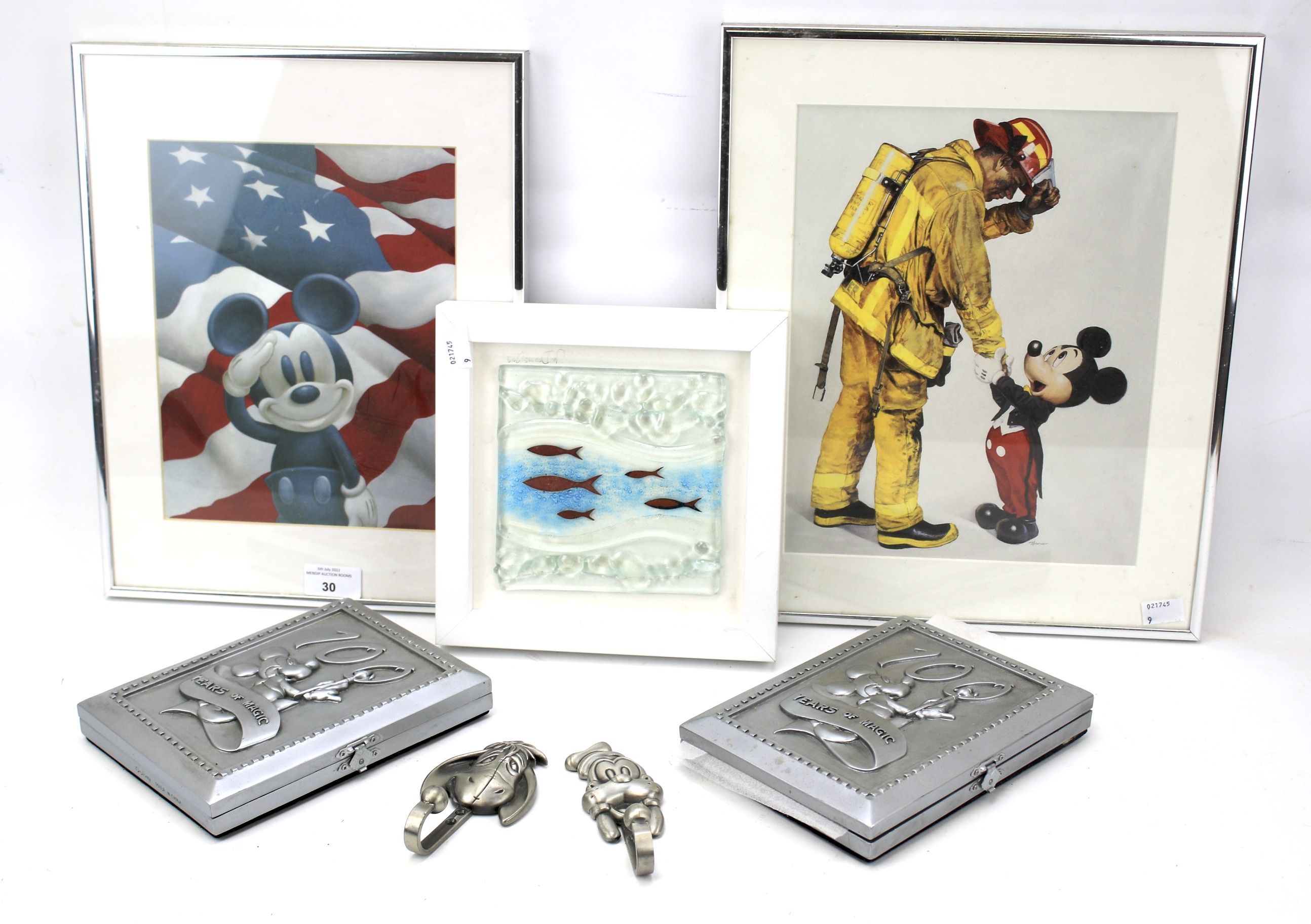An assortment of Disney related items.