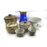 An assortment of stoneware pottery.