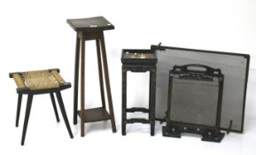 Three wooden stools and two fire grates.