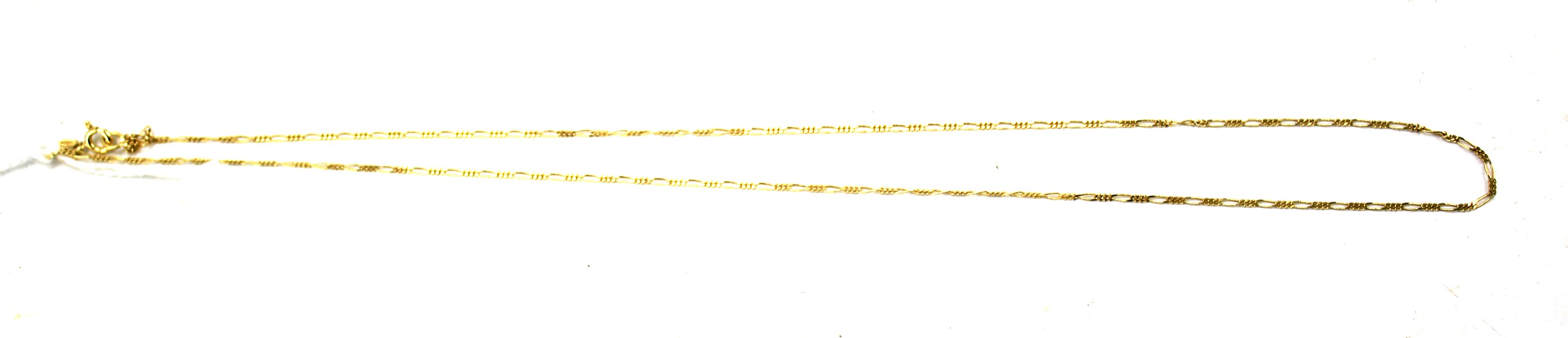 A yellow metal chain necklace. Marked '750'. Weight 2.