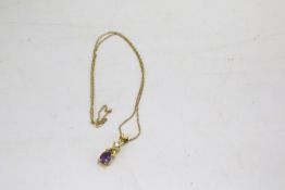 A 9ct gold necklace and yellow metal amethyst pendant.