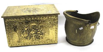 A hammered brass coal bucket and a helmet coal scuttle.