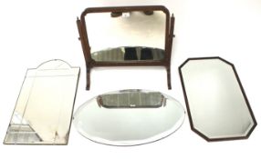 A dressing table mirror and three wall mirrors.