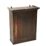 A 19th century oak wall cabinet.