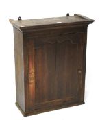 A 19th century oak wall cabinet.