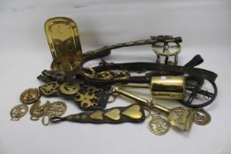 A collection of brassware.