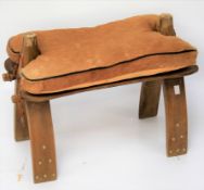 A vintage camel stool.